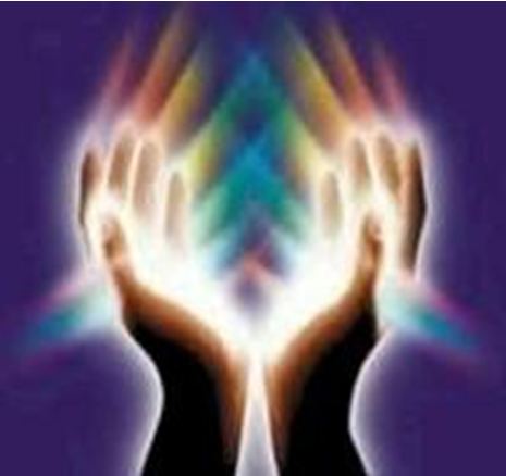 Image of hands held up in prayer, surrounded by lights